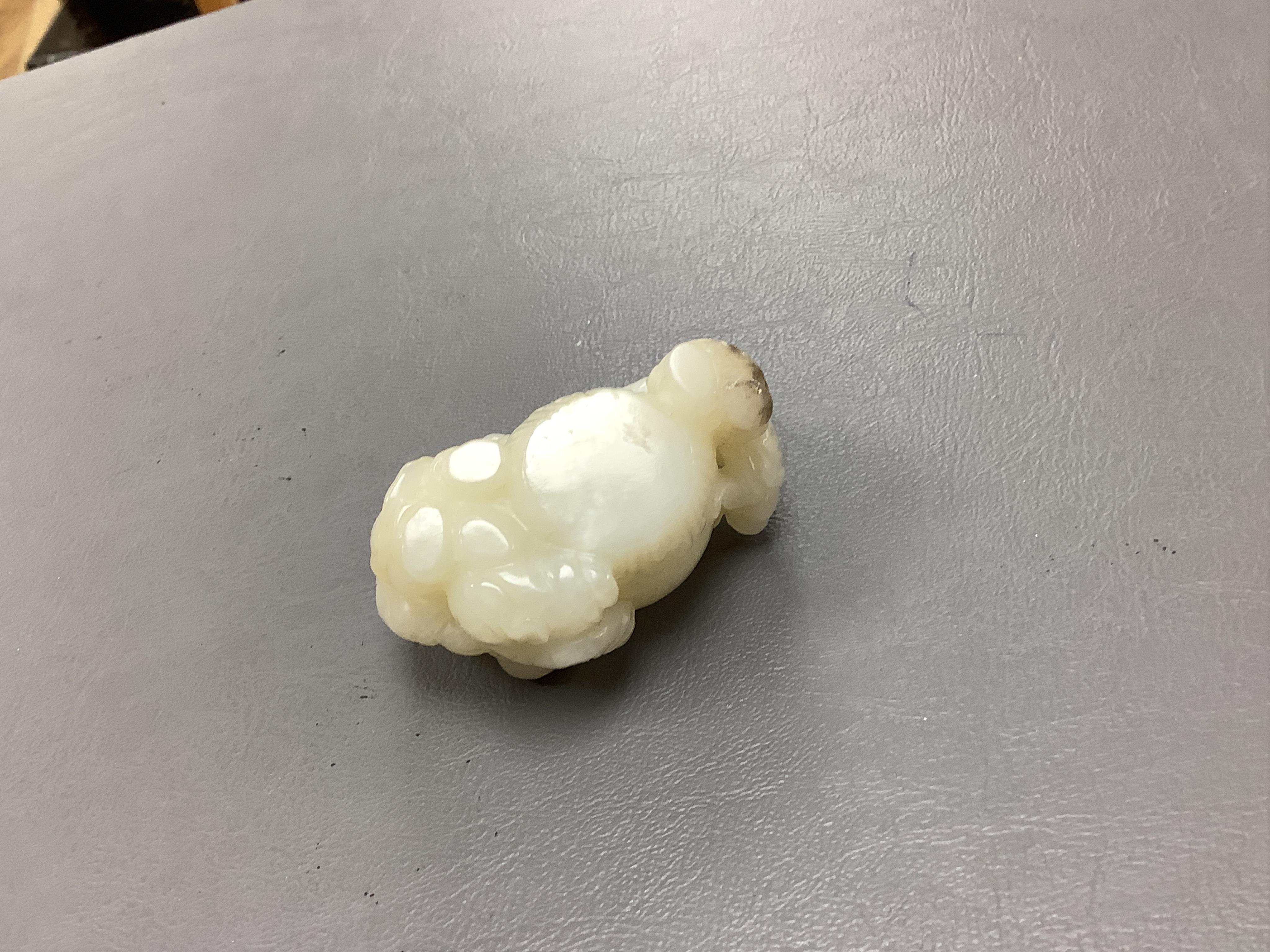 A Chinese white jade 'boys with jar' carving and three shoushan stone figures; luohan, girl with squirrel and mermaid (4), tallest 11cm